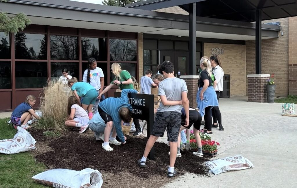 kids-planting-in-garden